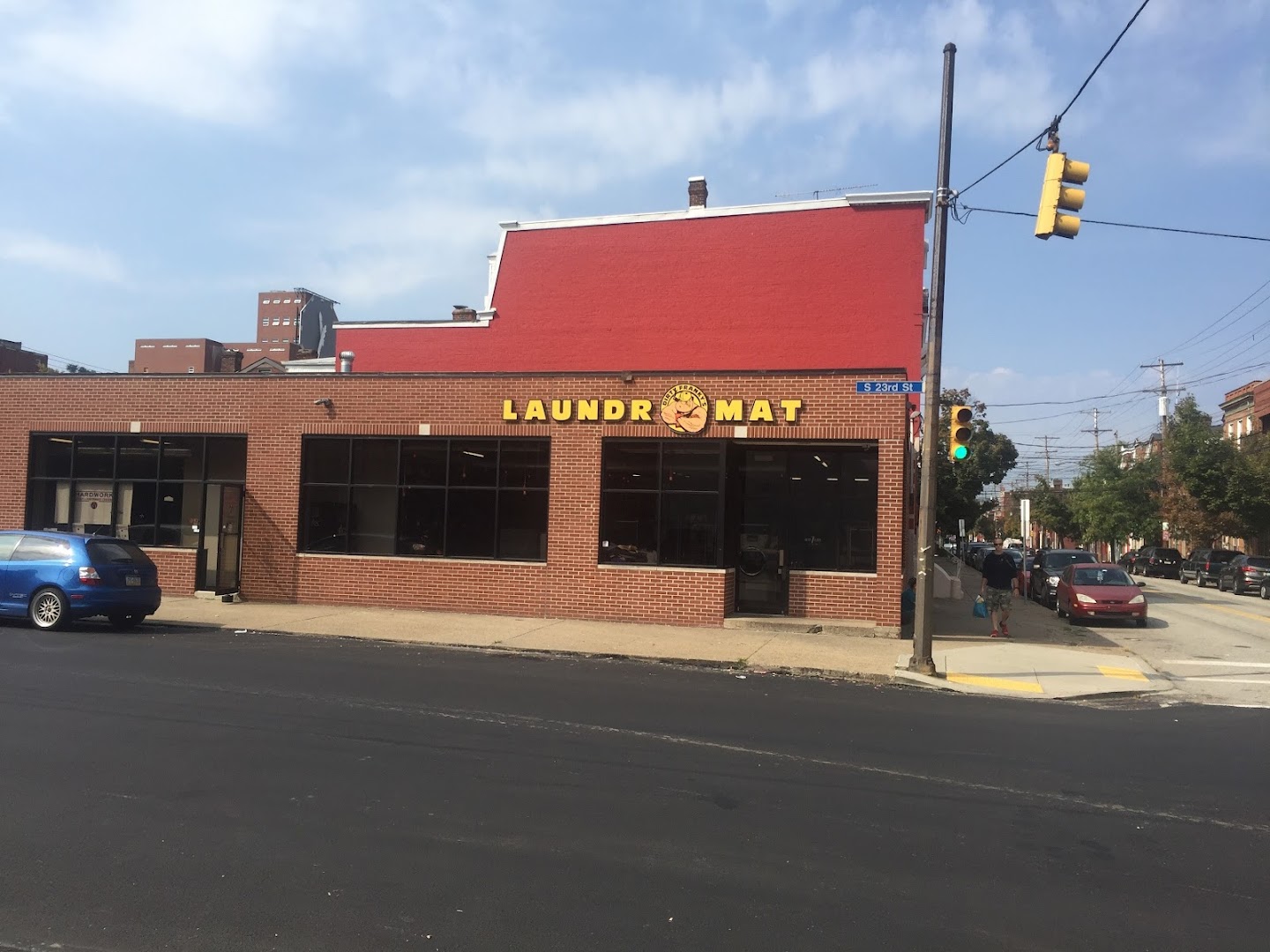 Corner building exterior of Dirty Franky's Laundromat at South 23rd Street